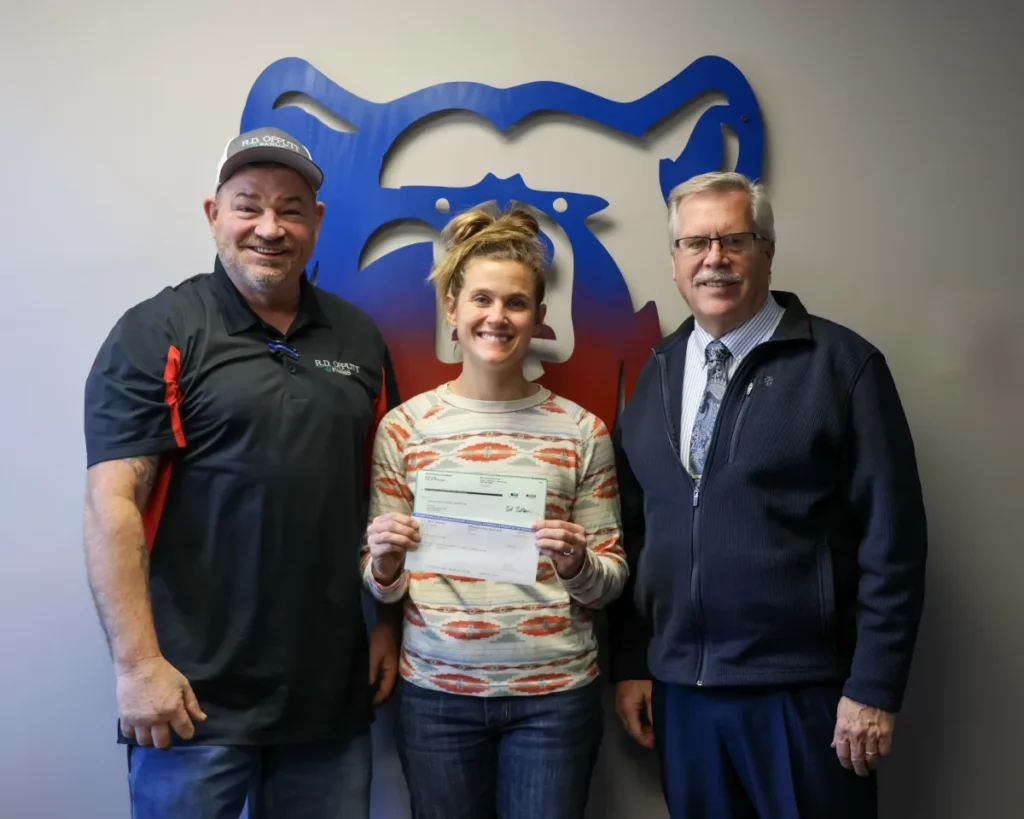 Bertha Hewitt School District recipients holding checks