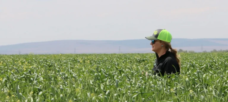 Michelle Miller, the Farm Babe, in a field