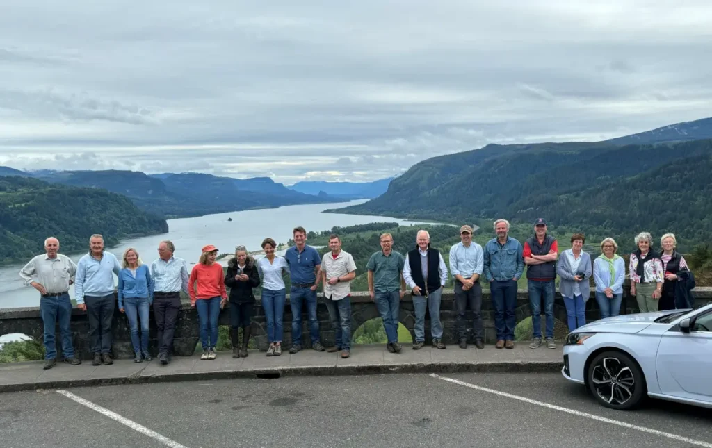 Group photo beside landscape