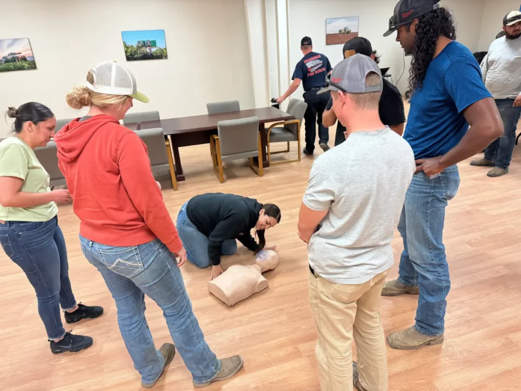 Group participating in CPR training session